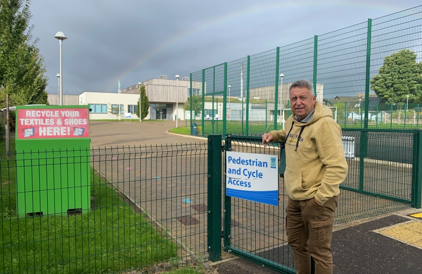 Councillor Forbes beside Invergowrie Primary School