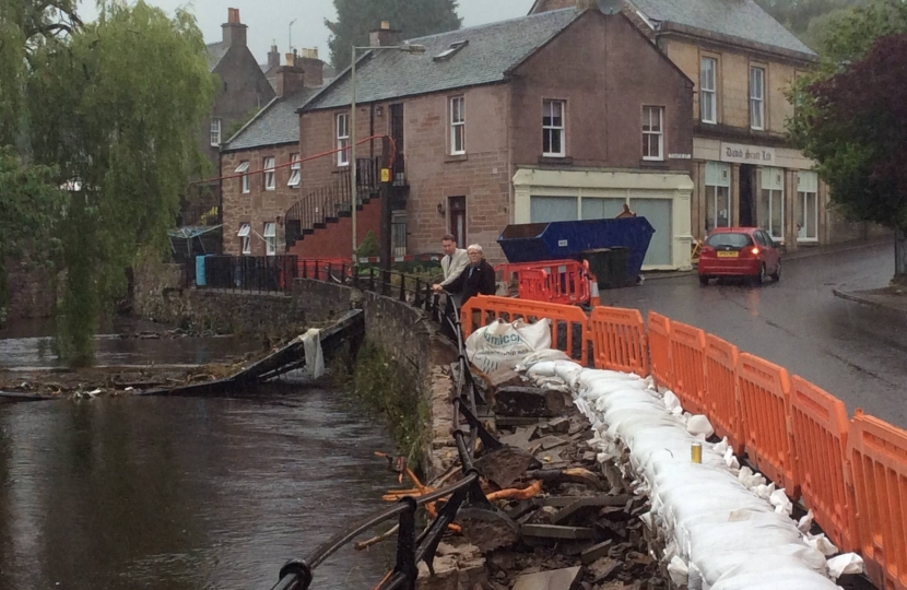 Murdo Fraser with Cllr Dennis Melloy at one of Alyth's flood damaged bridges