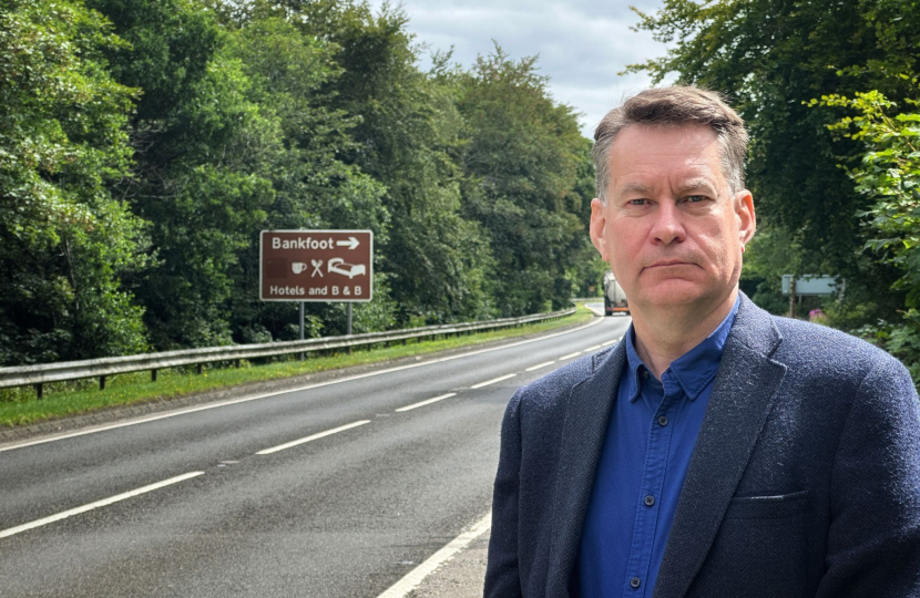 Murdo Fraser beside the A9.