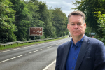 Murdo Fraser MSP beside the A9